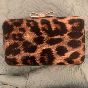 Hard shell clutch with shoulder strap